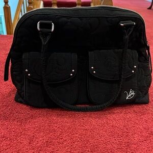 Vera Bradley purse. Black exterior with flower interior.